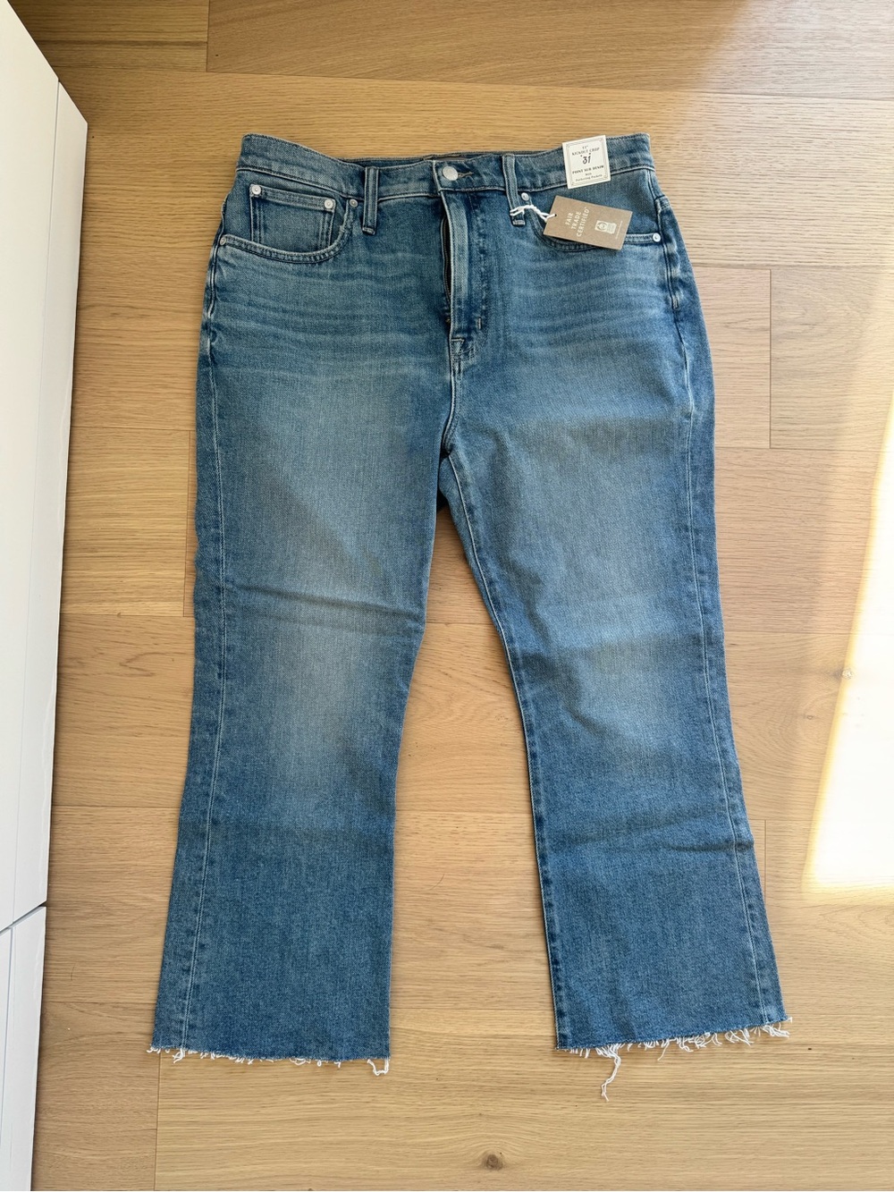 High-Rise Medium Blue Cropped Flare Jeans with Raw Hem